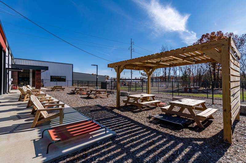 outdoor dog park with patio & bar