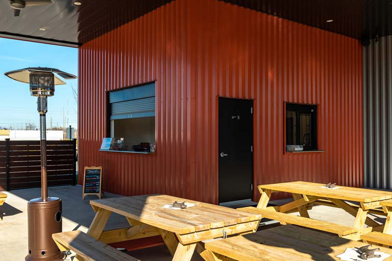 Outdoor bar at the Bark Yard, commercial bar designed by Schaub Projects