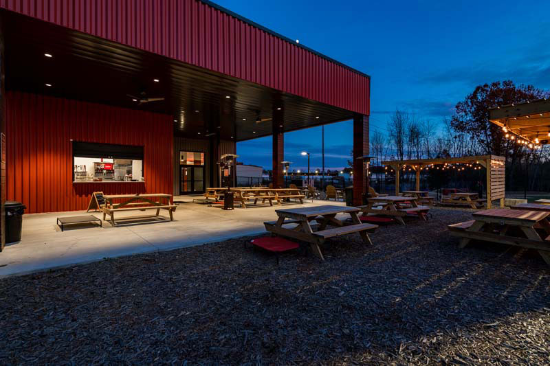 Picnic tables at the Bark Yard, designed by Schaub Projects